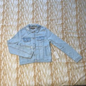 Distressed light denim jacket